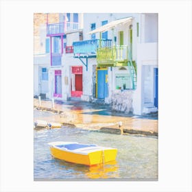 Milos, Greece I Yellow boat at fishing village of Klima with colorful houses on Mediterranean sea for a pastel summer aegean vibes aesthetic photography on Cyclades islands Santorini during Europe road trip Canvas Print