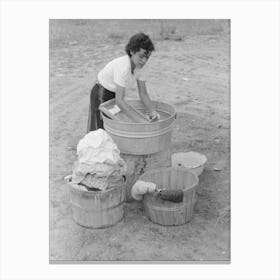 Daughter Of Spanish American Farmer Washing, Chamisal, New Mexico By Russell Lee Canvas Print