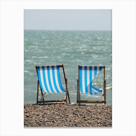 Deck Chairs On The Beach Canvas Print