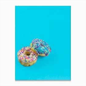 Glazed Donuts With Colorful Sprinkles On Blue Canvas Print