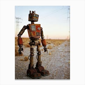 Rusty Toy Robot Standing Amidst A Sprawling Desolate Wasteland Eroded Structures Faintly Visible In Canvas Print