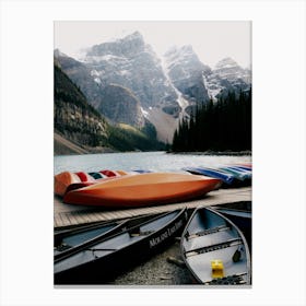 Moraine Lake Canoes Canvas Print