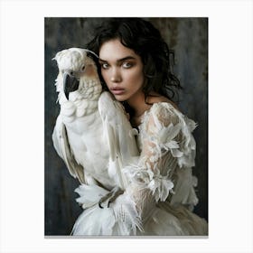 woman holding a White Parrot Canvas Print