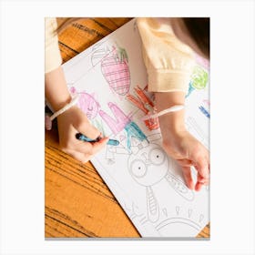 Child Draws On Paper Canvas Print