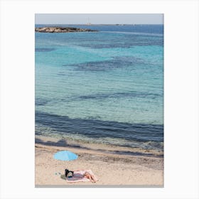 Sunbathing On The Beach Canvas Print