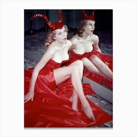 Swedish Actress Anita Ekberg Sitting By A Mirror In A Red Satin Dress And A Sequinned Devil Horn Cap, Circa 1956 Canvas Print