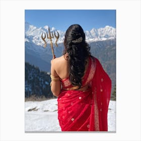 A Married Indian Woman Adorned In Her Traditional Sari Her Back Towards Us As She Stands Against A Canvas Print