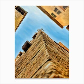 Lucca Guinigi Tower and Its Rooftop Trees. The Guinigi Tower, a historic landmark in Lucca, Italy, stands out for its unique rooftop garden featuring tall oak trees. Built in the 14th century, the red-brick structure embodies medieval architecture and offers panoramic views of the city for visitors who climb to the top. 1 Canvas Print