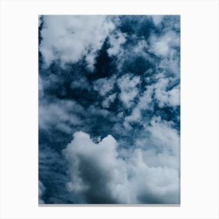 The Clouds Up In The Blue Sky Canvas Print