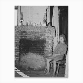 Daughter Of Cajun Day Laborers Sitting In Front Of Fireplace In Home Near New Iberia, Louisiana By Russell Lee Canvas Print