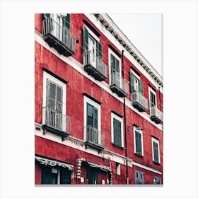 Red Building With Green Shutters Canvas Print
