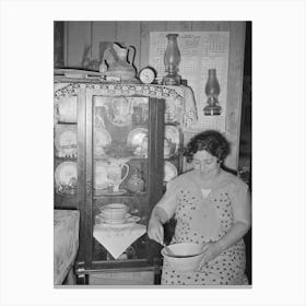 Mexican Woman Beating Cake In Front Of China Cupboard, San Antonio, Texas By Russell Lee Canvas Print