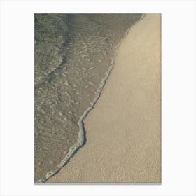 Clear sea water on the sandy beach Canvas Print