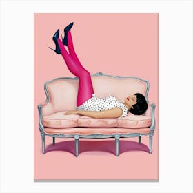 Girl Laying On A Pink Couch Canvas Print