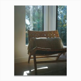 Neutral Wooden Lounge Chair In Front Of Rainforest Window In Scandinavian Style Living Room Canvas Print