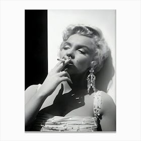 Portrait Of American Actor Marilyn Monroe In A White Beaded Gown Leaning Against A Wall Smoking A Cigarette Canvas Print