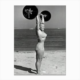 Woman Lifting Weights At Beach Canvas Print