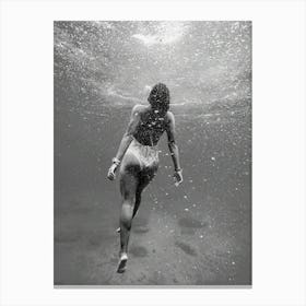 Woman Swimming Underwater Canvas Print