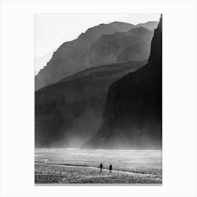 Two People Walking Through A Riverbed In The Himalayas Canvas Print