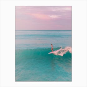 Surfer Riding A Wave Canvas Print