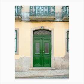 The vintage green door nr. 9 1899 in Alfama, Lisbon, Portugal - summer street and travel photography by Christa Stroo Canvas Print