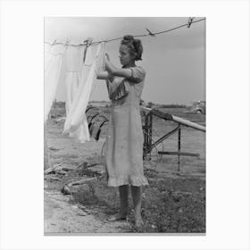 Daughter Of Tenant Farmer Hanging Up Clothes Near Warner, Oklahoma By Russell Lee Canvas Print