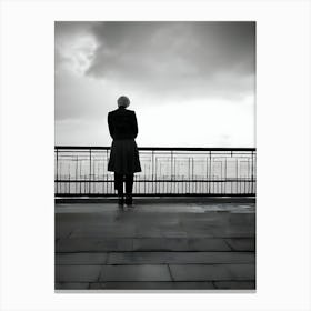 Silhouette Of A Man On A Railing-Reimagined Canvas Print