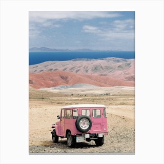 Pink Jeep In The Desert Canvas Print