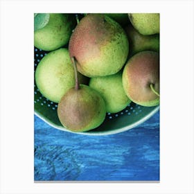 Green Pears On Blue Table Canvas Print