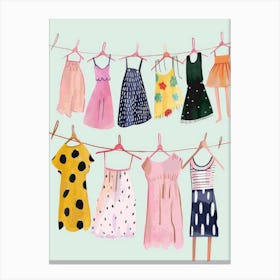 Children'S Clothes Hanging On Clothesline Canvas Print