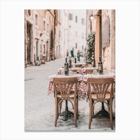 Table And Chairs In A Restaurant Canvas Print