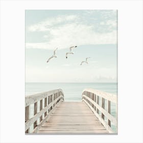 Seagulls Flying Over A Pier Canvas Print