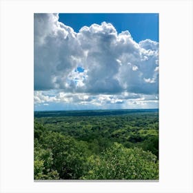 Cumulus Clouds Dominating A Spring Landscape Sunlight Peeks Through The Overcast Sky Casting A Mos (6) Canvas Print