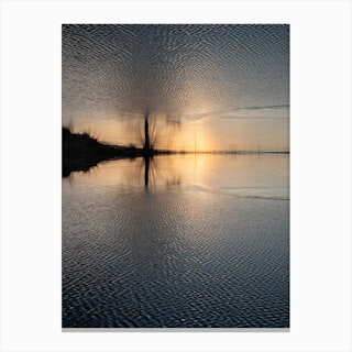 Sunset at the lake, golden reflections in water Canvas Print