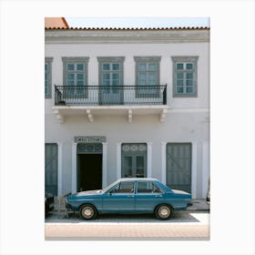 Blue Car In Front Of A Building Canvas Print