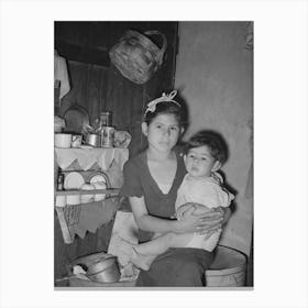 Mexican Girl With Baby Brother In Corner Of Room In Which The Entire Family Lives, Robstown, Texas By Russell Lee Canvas Print