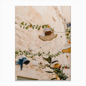 Hats And Flowers hanging in the streets in Puglia, Italy | travel photography Canvas Print