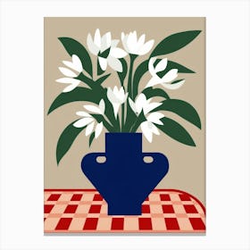 White Flowers In A Blue Vase Canvas Print