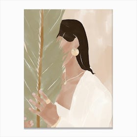 Woman Holding A Palm Leaf Canvas Print