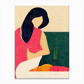 Girl Sitting In A Kitchen With A Bowl Of Fruits Canvas Print