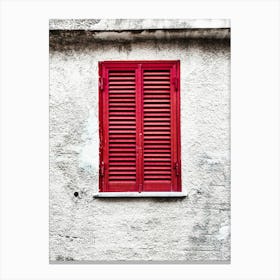 Red Shutters On A Window Canvas Print
