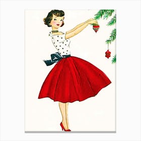 Young Woman In Red Dress Decorating A Christmas Tree Canvas Print