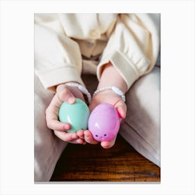 Child'S Hands Holding A Toy Canvas Print