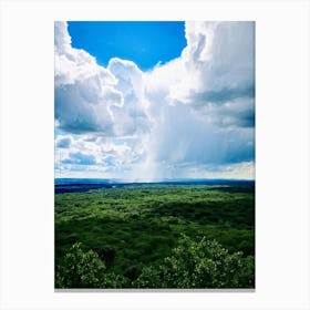 Cumulus Clouds Dominating A Spring Landscape Sunlight Peeks Through The Overcast Sky Casting A Mos (7) Canvas Print