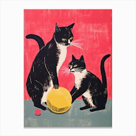 Two Cats Playing With A Ball Canvas Print