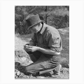 Prospector Examining A Piece Of Rock, Pinos Altos, New Mexico By Russell Lee Canvas Print