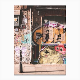 London, England I Shoreditch's colorful brick wall with street art photography and creative design graffiti mural at sunrise light on a Londoner street with an industrial aesthetic urban ambience cityscape Canvas Print