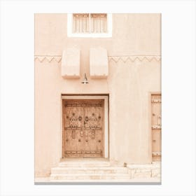 Peach Coloured Wall With A Door Canvas Print