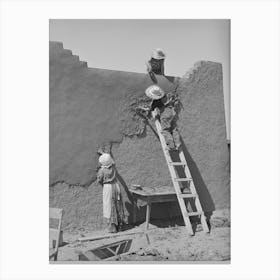 Once A Year The Women In The Spanish American Families Replaster The Adobe Houses, Neighboring Women Are Hired Canvas Print