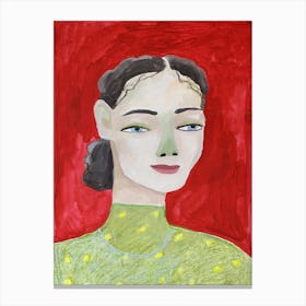 Woman in green sweater on red background Canvas Print